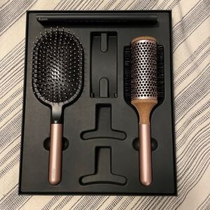 Dyson rose gold round brush, paddle brush and detangling comb